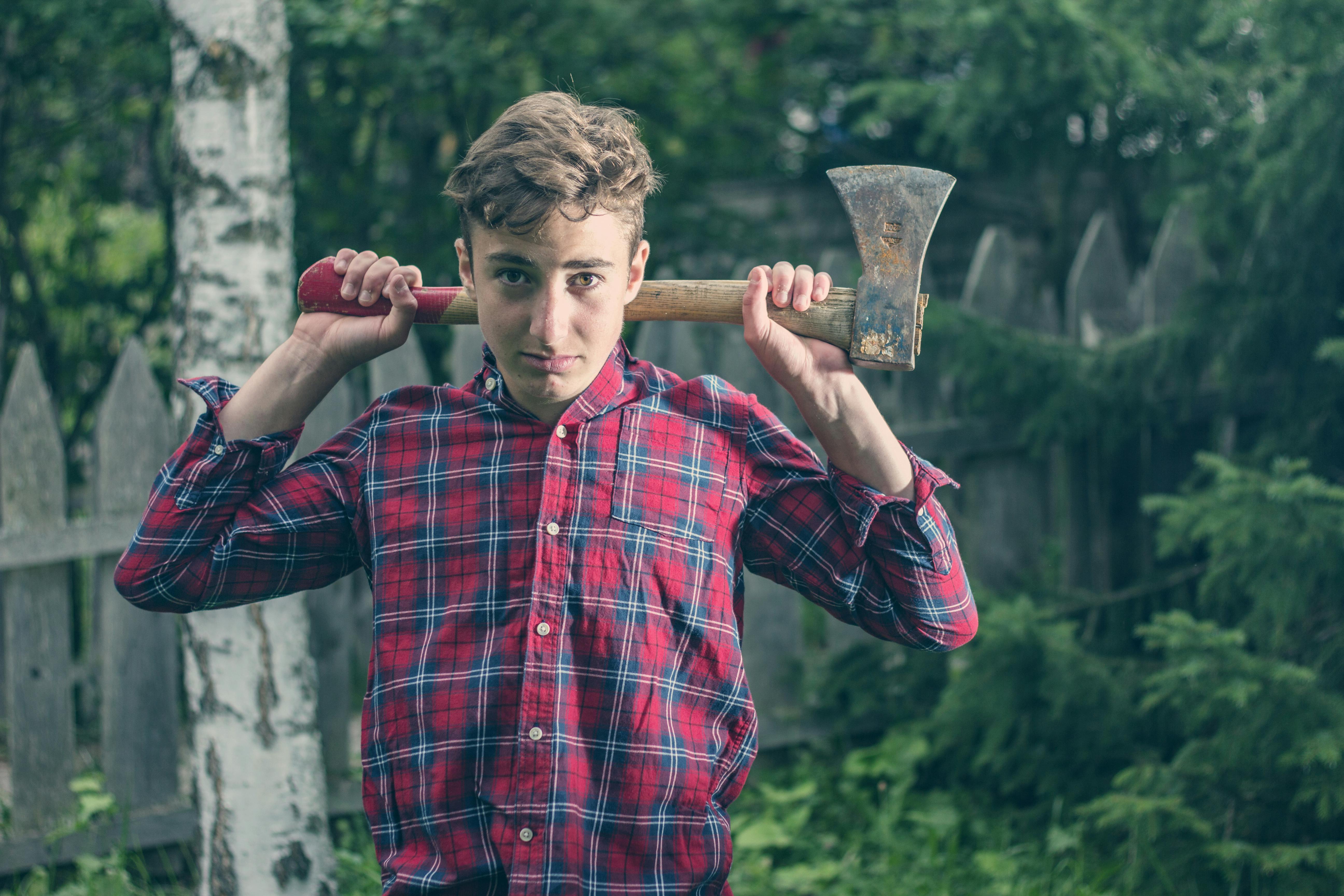 Man Holding an Axe · Free Stock Photo