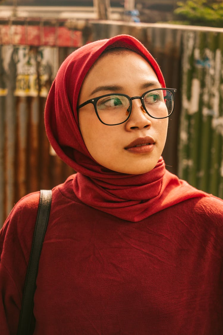 Woman In Red Hijab And Eyeglasses