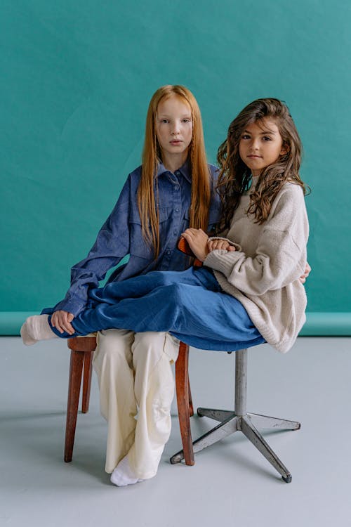 Portrait of Two Girls Sitting