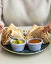 Person Holding White Ceramic Bowl With Food