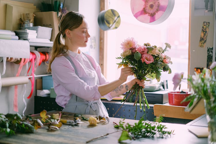 A Woman Arranging Flowers