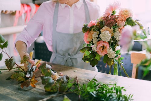 Free A Person Arranging Flowers Stock Photo