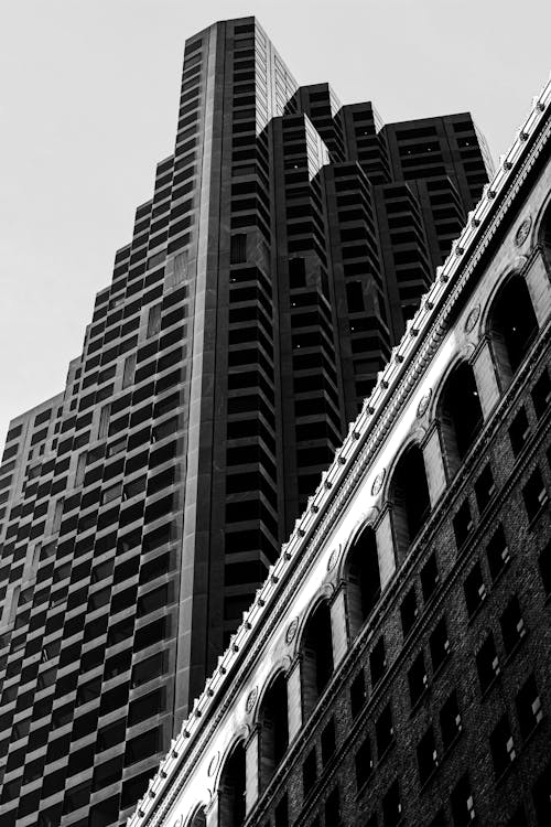 A Grayscale Photo of a High Rise Building