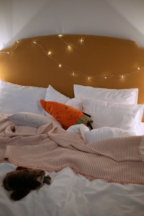 Free White Pillows on the Cozy Bed Stock Photo