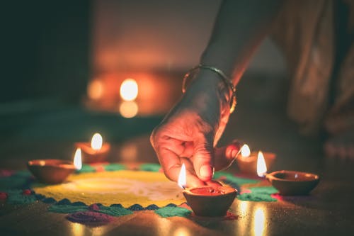 Free Person Holding Lighted Candle Stock Photo
