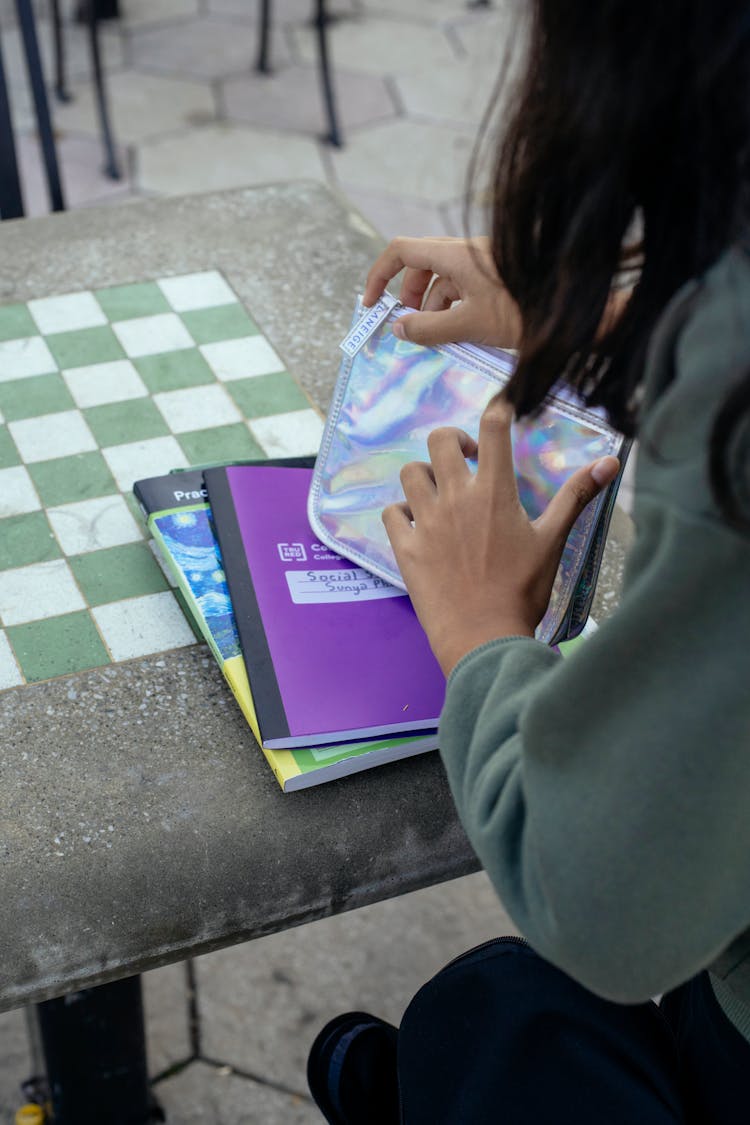 Crop Teen Girl Studying In Park