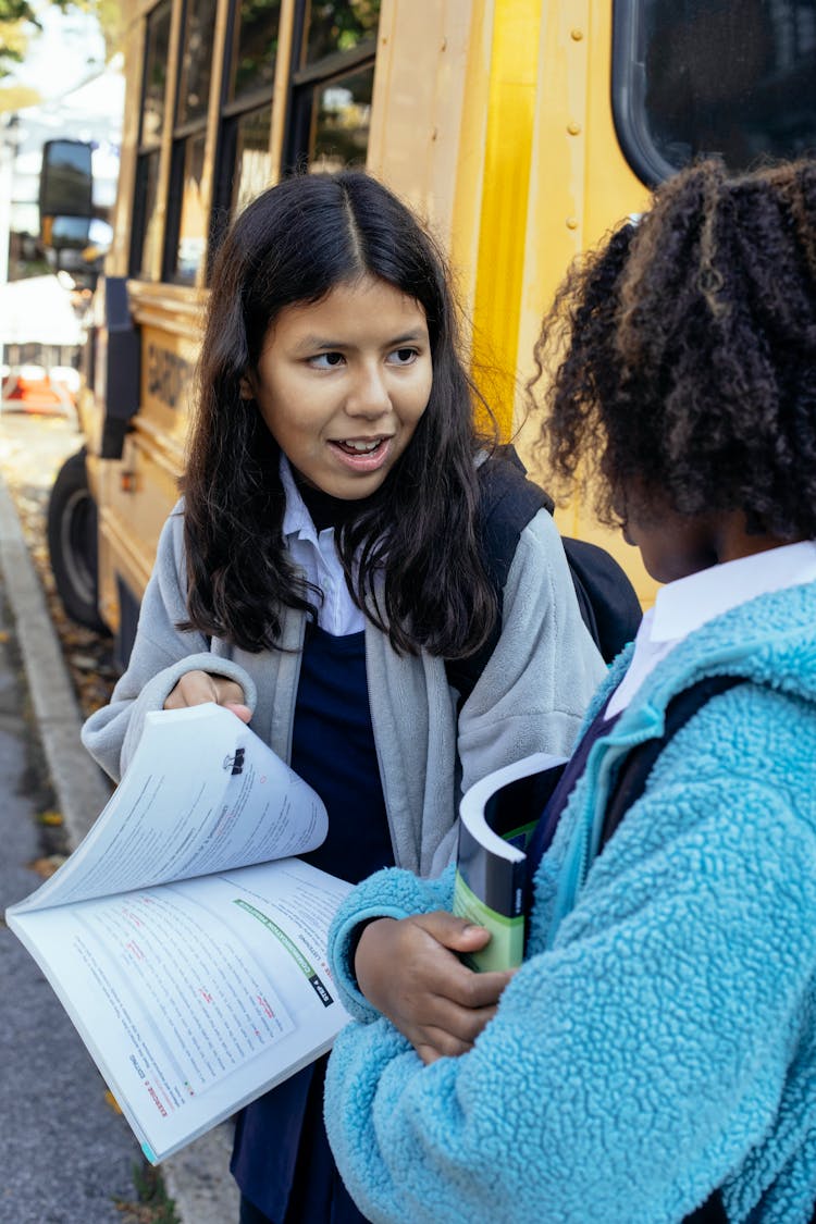 Happy Multiethnic Children Discussing School Together