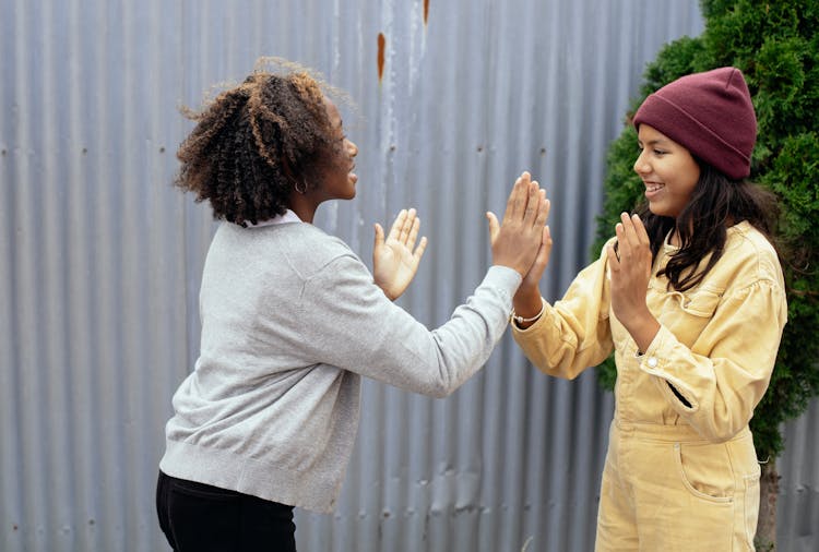 Laughing Diverse Girls Playing Patty Cake