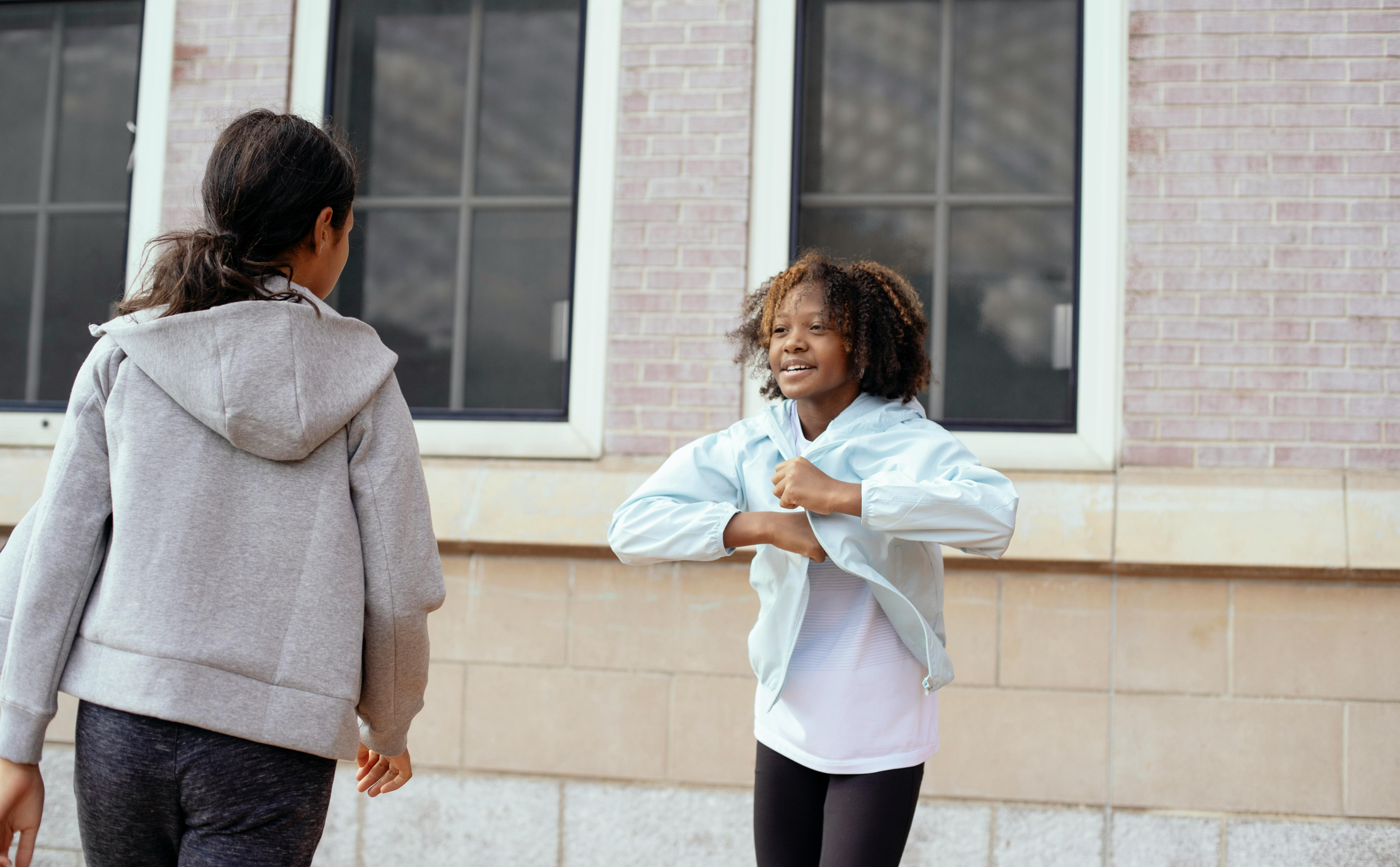 cheerful girls having fun during pe class