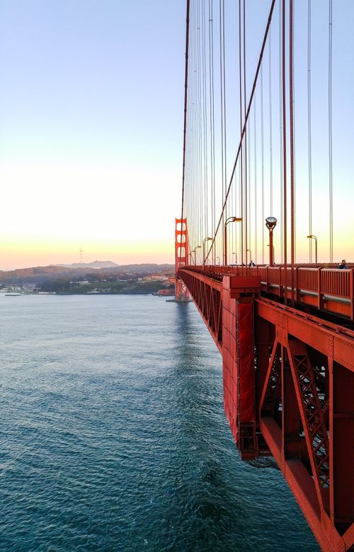 Free Stunning view of the Golden Gate Bridge at sunset in San Francisco, captured from a unique angle. Stock Photo