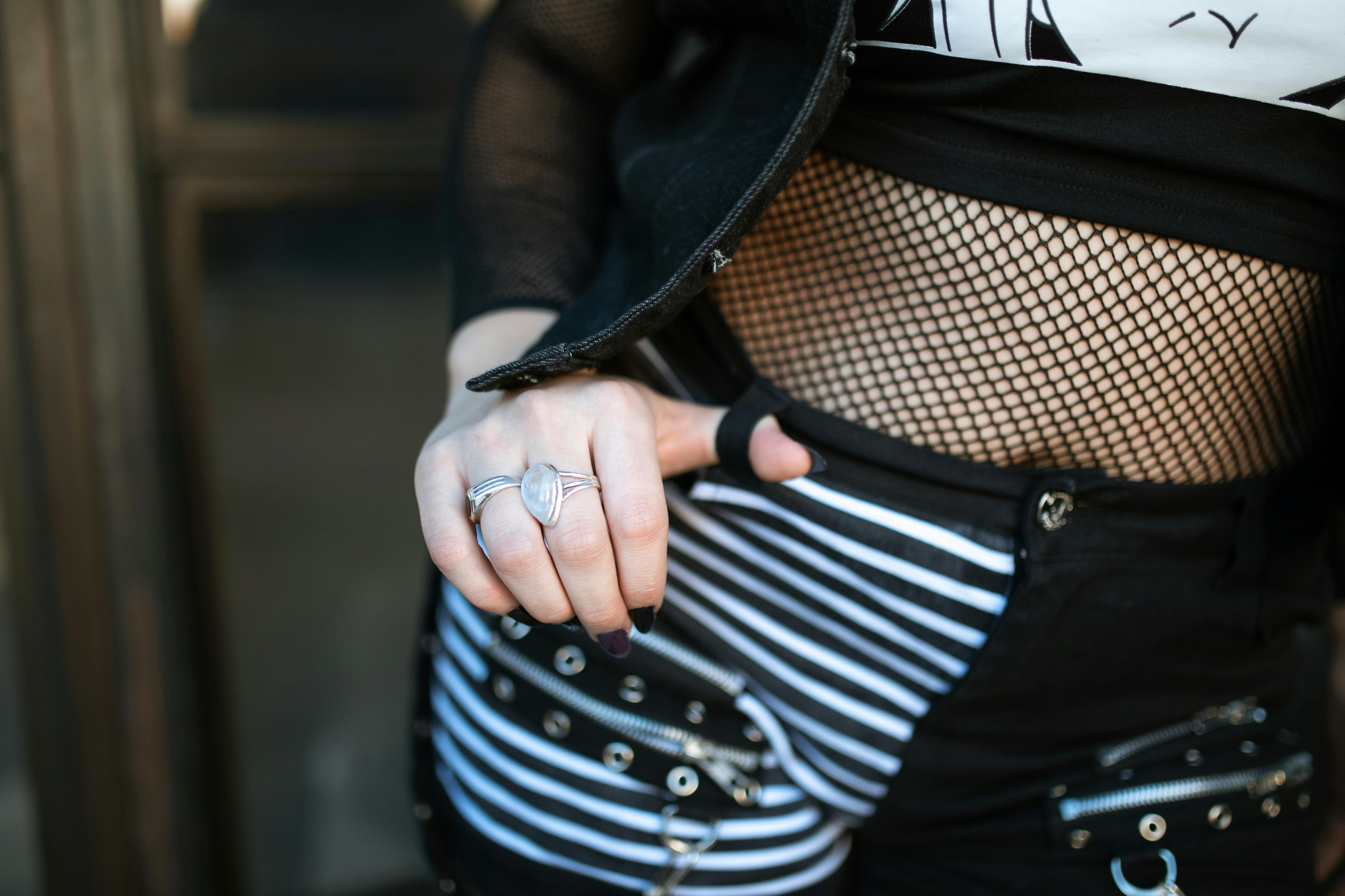 woman in black and white stripe shirt