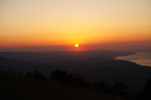 Captivating sunrise over Luchyste mountains, showcasing vibrant colors and serene nature.