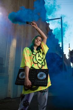 Colorful DJ with smoke bomb creating an energetic street vibe.