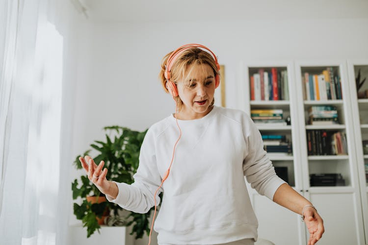 Woman Dancing With Headphones On