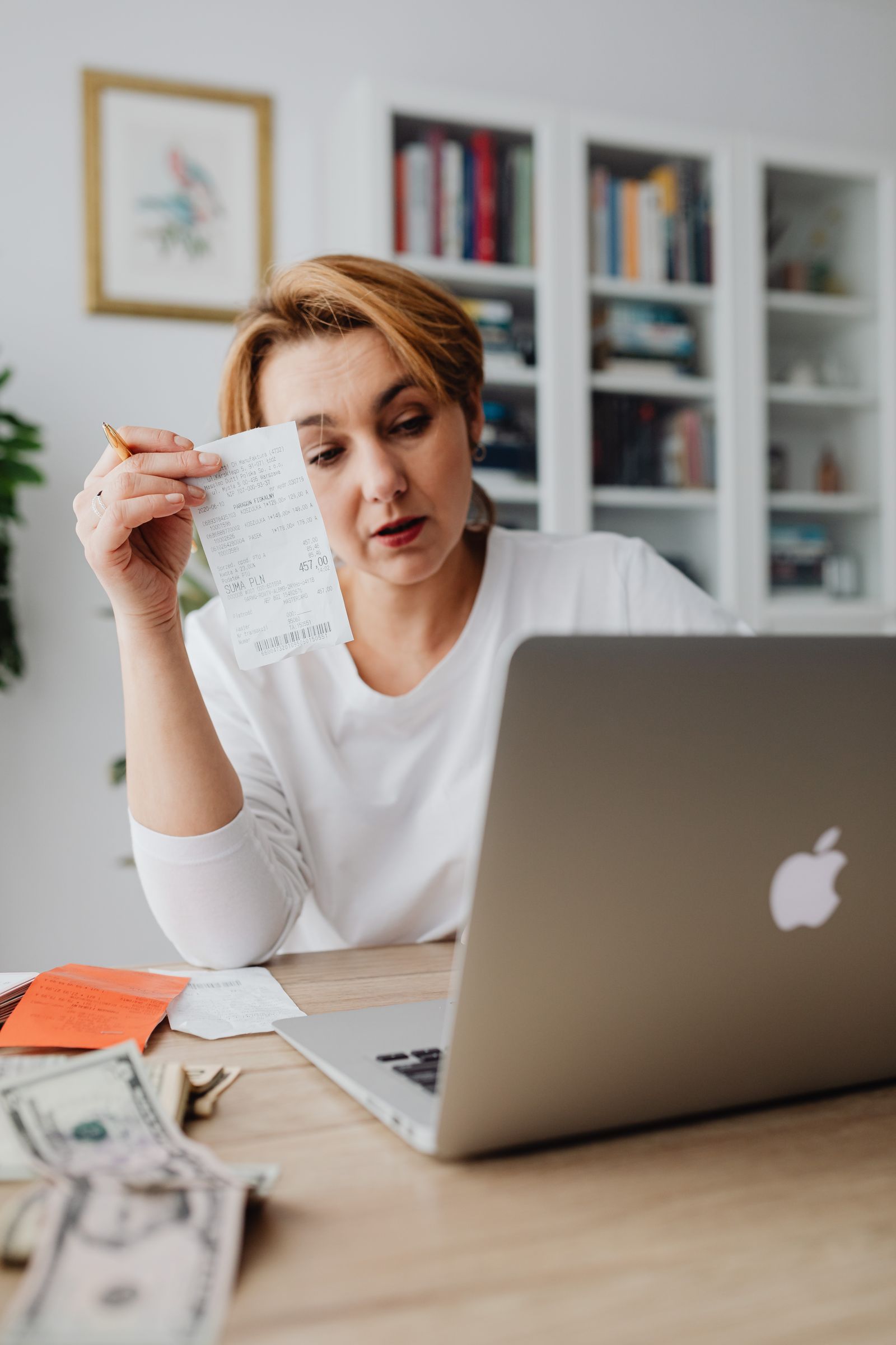 Cash jobs tax return Australia guide for Nepali students and workers with laptop, receipts and cash on a table