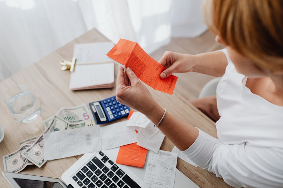 A person organizing documents and receipts at a desk, symbolizing the meticulous process of gathering evidence - Medical malpractice claims Florida A person organizing documents and receipts at a desk, symbolizing the meticulous process of gathering evidence - Medical malpractice claims Florida