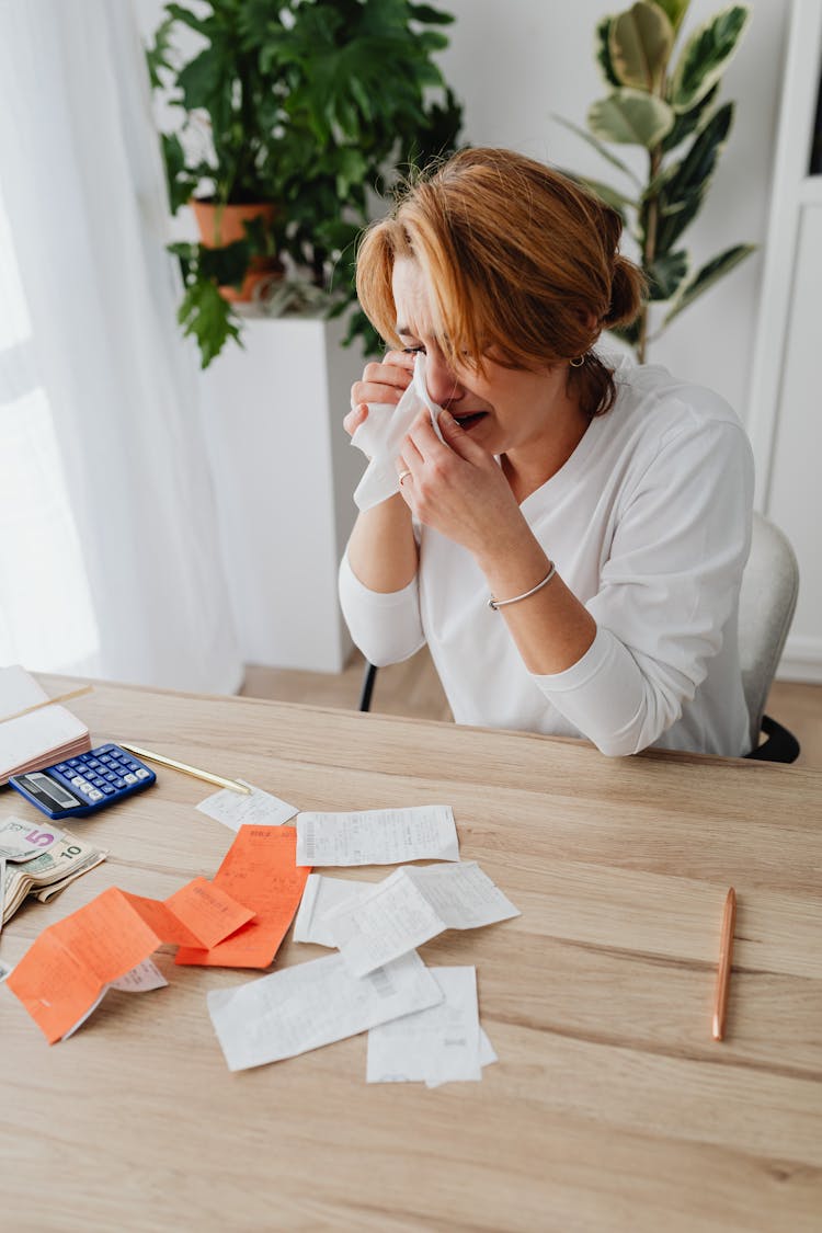 Woman Crying Over Unpaid Bills