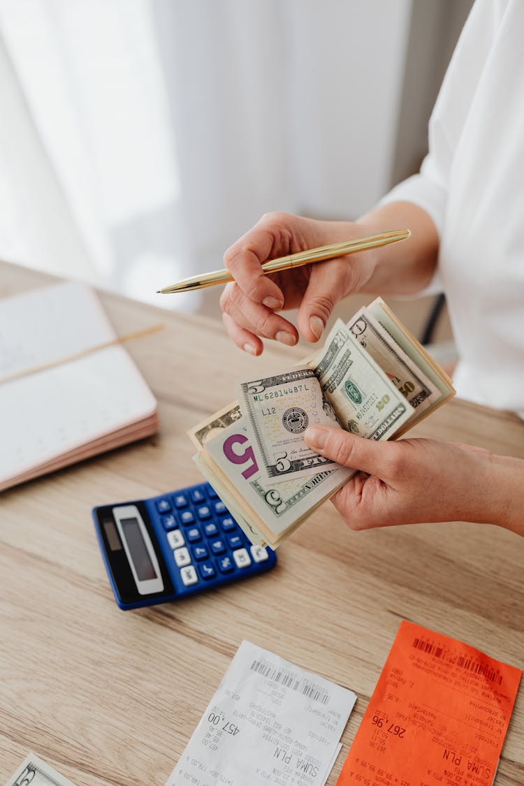 Woman Counting Cash 