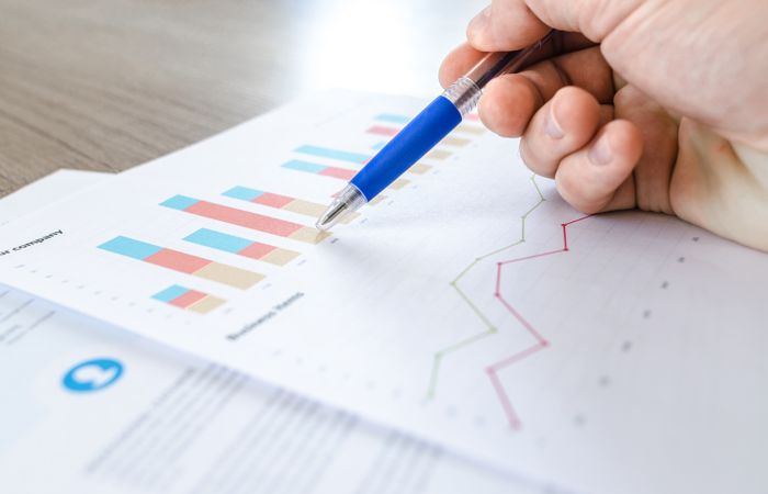 Printed performance report with colourful graphs