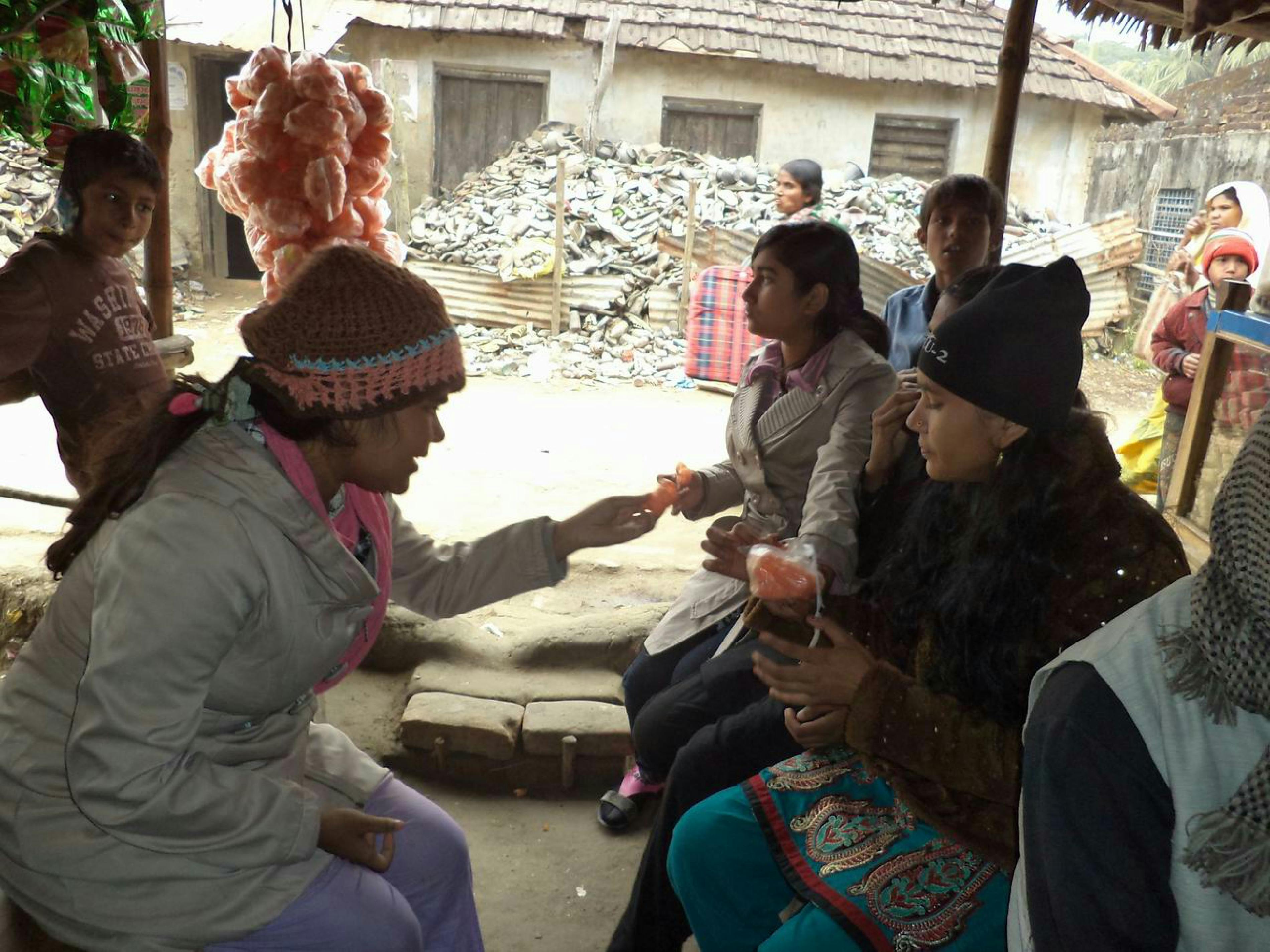 Close-up of mortgage refinancing documents with calculator and pen showing detailed cost breakdown