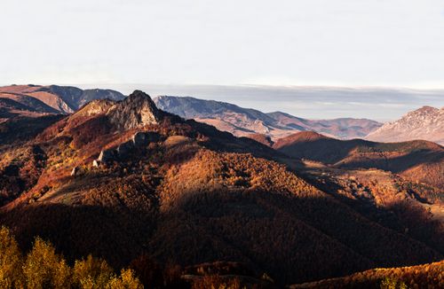 Free Breathtaking view of Apuseni Mountains in fall, showcasing vibrant foliage and rolling hills. Stock Photo