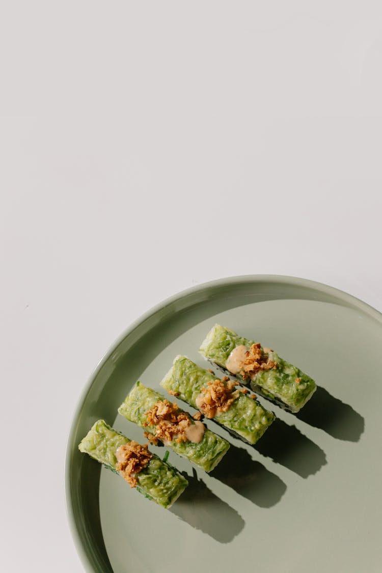 Flatlay Of Yummy Sushi On Ceramic Plate