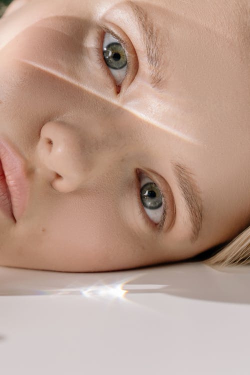 Woman's Face in Close Up Photography