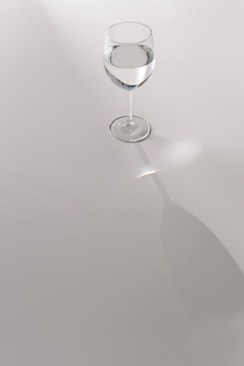 Glass of Water on White Surface