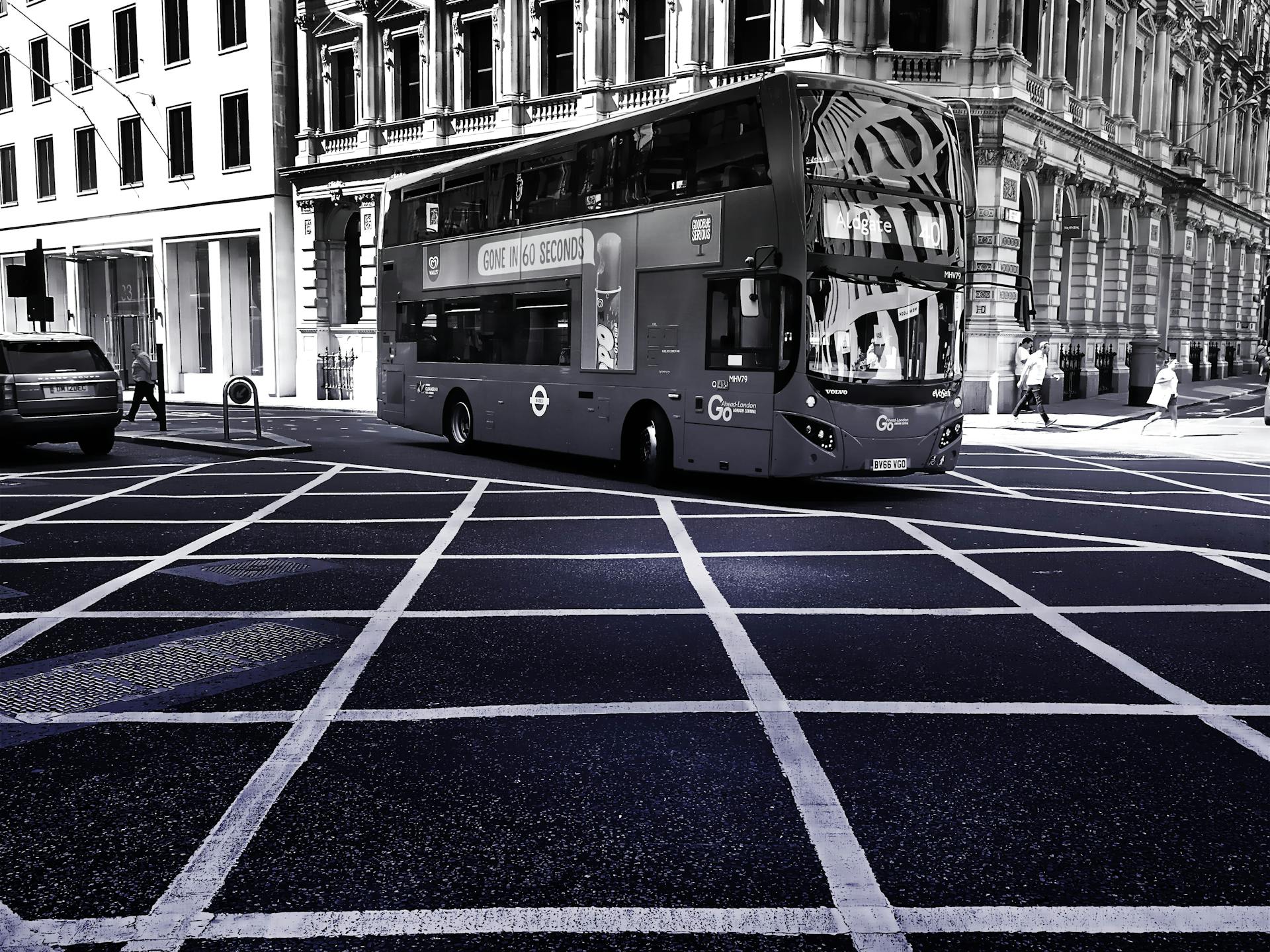 Grayscale Photo of Double Decker Bus on Road