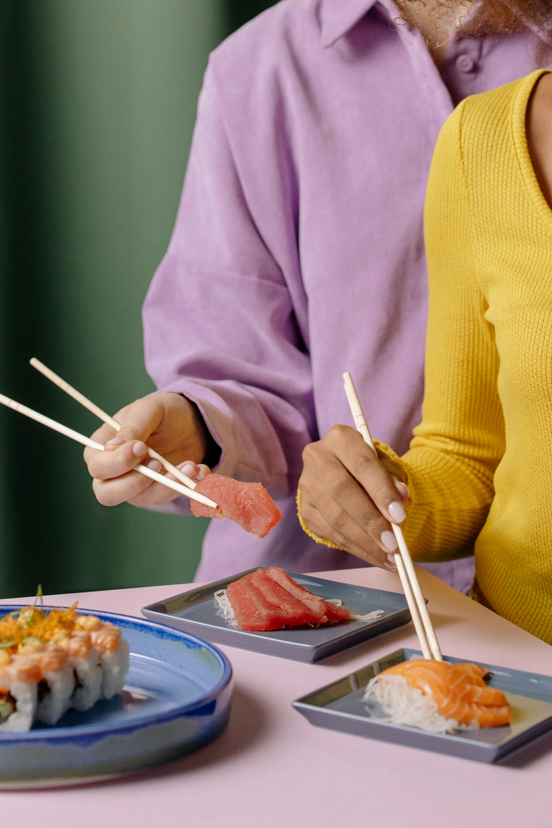 People Enjoying Sushi Dish · Free Stock Photo