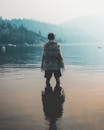 Person Standing in Body of Water