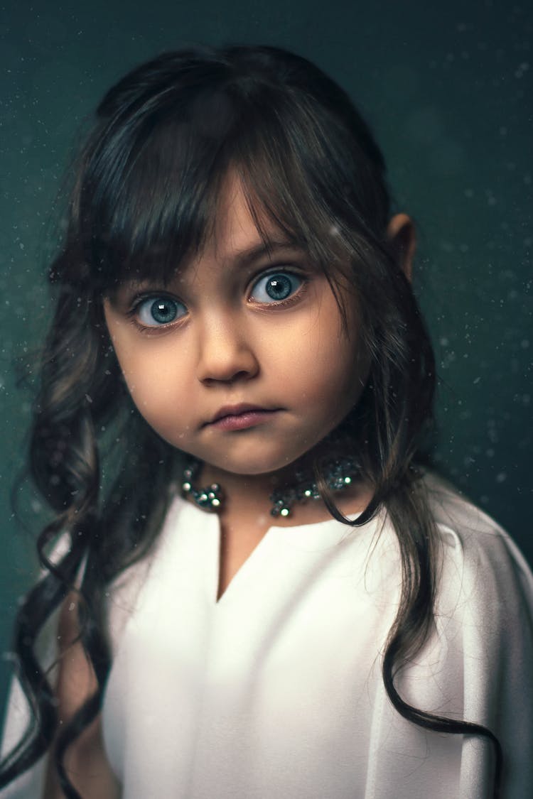 Portrait Of A Girl With Blue Eyes