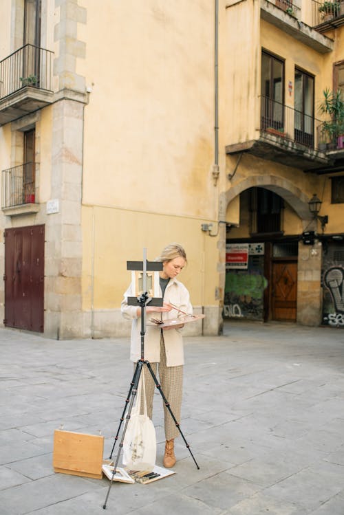 Artist with Easel on Sidewalk