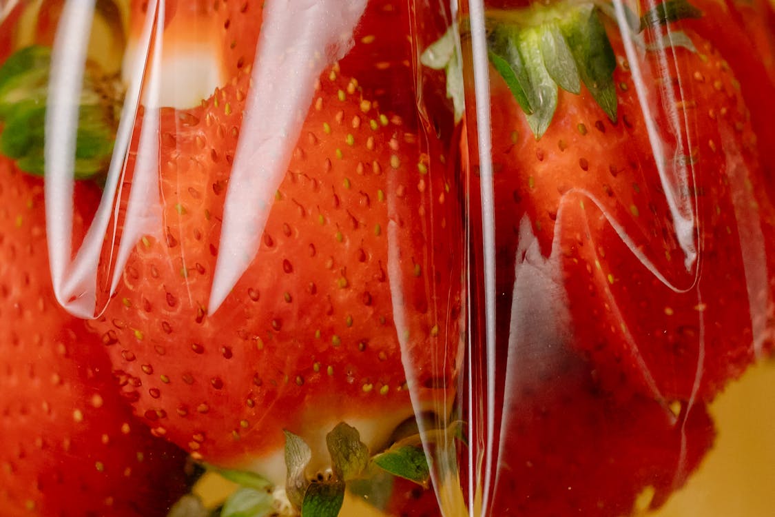 Red Strawberry in Clear Glass Container