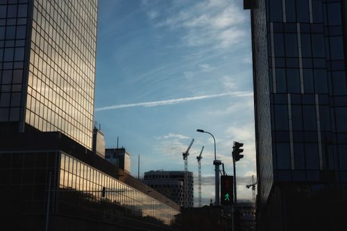 Free Skyline with modern office buildings in Brussels at sunset, showcasing urban development. Stock Photo