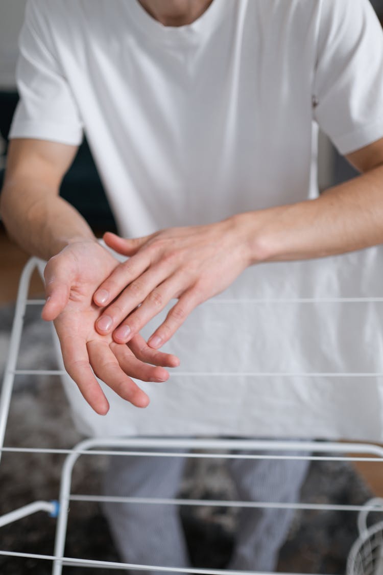 Close-Up Shot Of A Person's Hands And Fingers