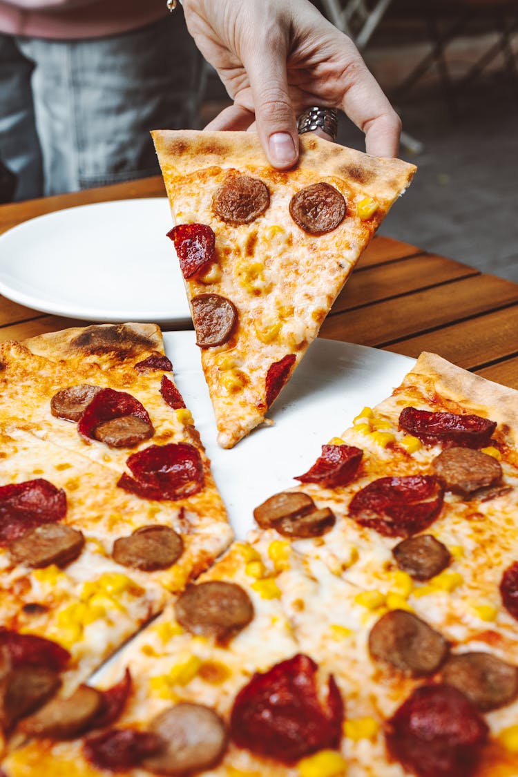 Pizza On White Ceramic Plate