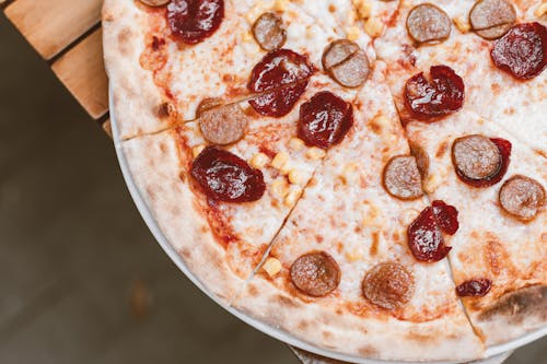 Free Pizza With Pepperoni and Cheese Stock Photo