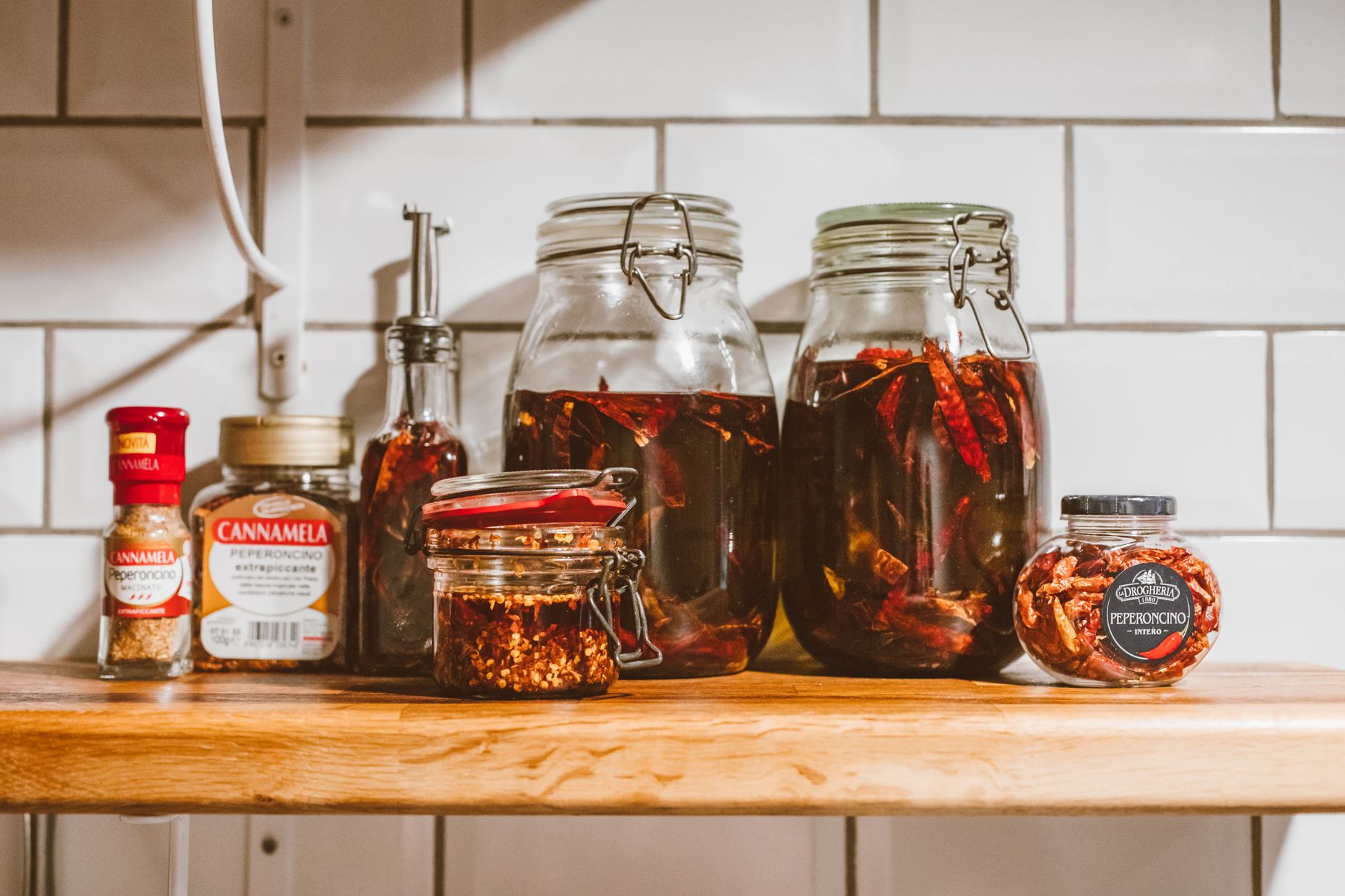 Golden chili oil in a glass bottle
