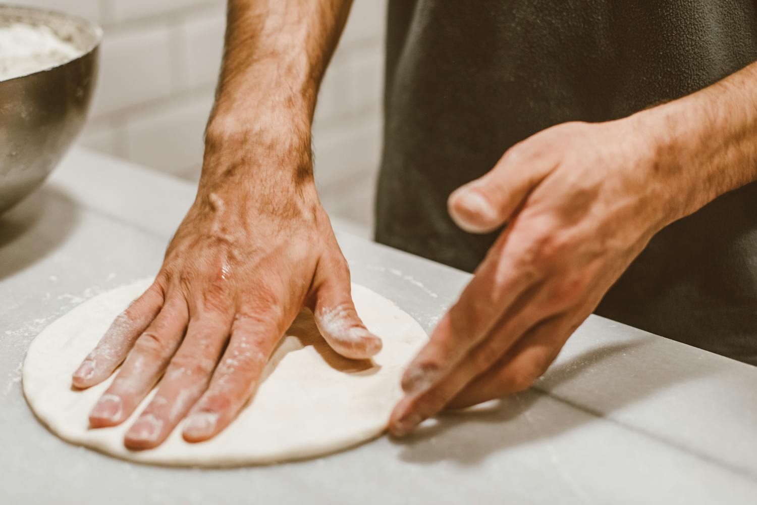 Handcrafted pizza dough preparation