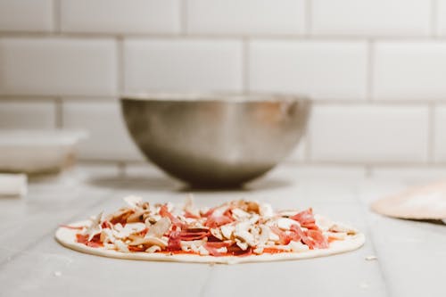 Ingredients on Pizza Dough