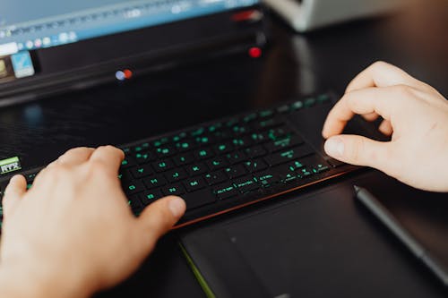 Free Close up of Hands on Computer Keyboard Stock Photo