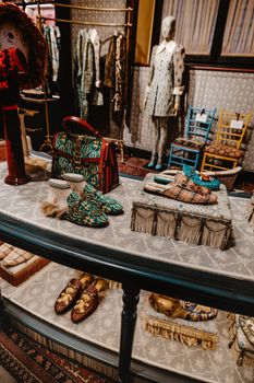 Elegant designer fashion display in a Florence boutique featuring stylish clothing and accessories.