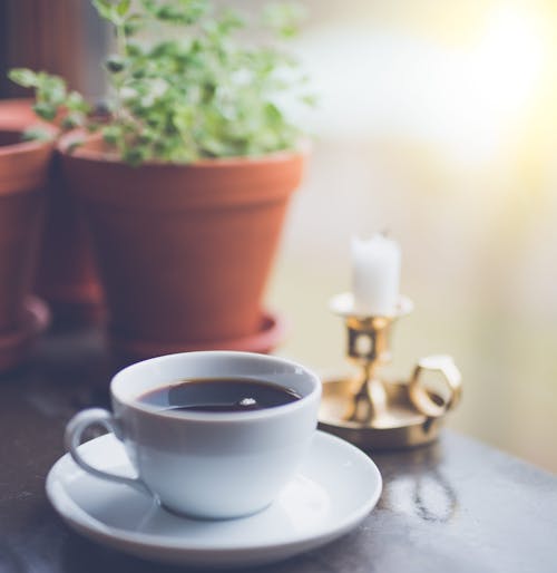 Free Coffee Mug on White Saucer Stock Photo