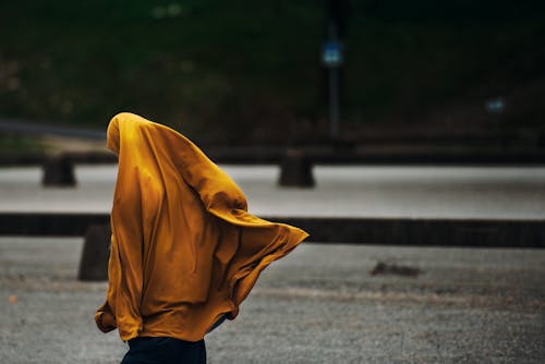 Free Person Covered With Yellow Blanket Stock Photo