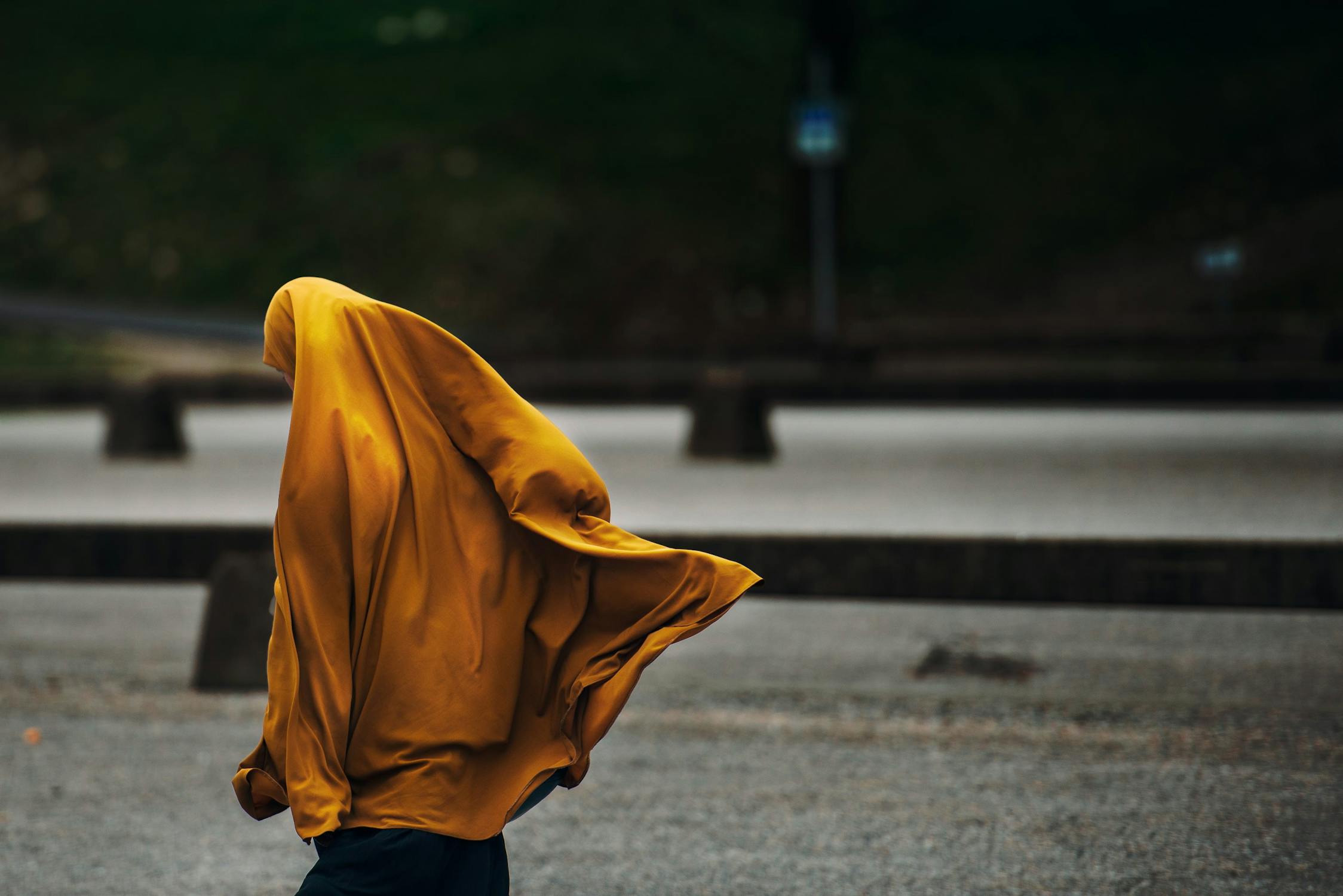 Muslim Fruad Photo by Janko Ferlic from Pexels: https://www.pexels.com/photo/person-covered-with-yellow-blanket-590491/