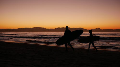 Gratis stockfoto met strand, surfboards, zonsondergang