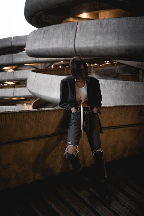 Trendy woman with fashionable hairstyle in denim