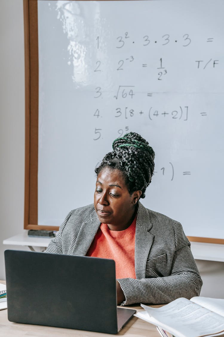 Clever Black Teacher Speaking About Mathematics Online