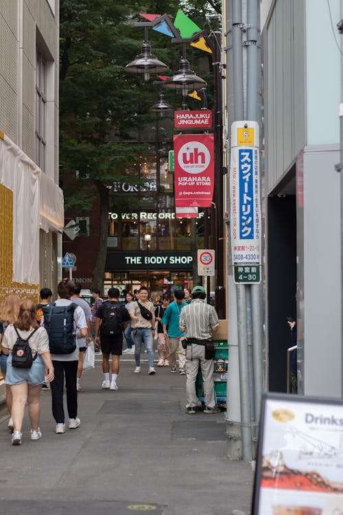 People Walking on the Alley